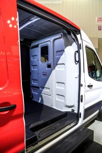 Interior of a van that has been outfitted with Knapheide Van Equipment partition