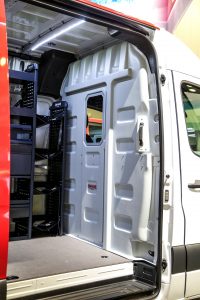 Van outfitted with Knapheide Van Equipment partition and shelving