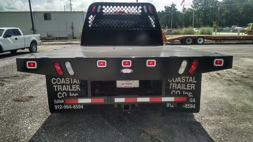 Coastal Truck and Trailer truck in parking lot